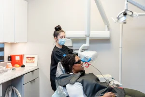 Dental team at For You Dental performing emergency treatment in Dallas, TX