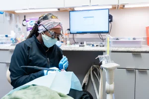 Dental team at For You Dental performing a same day implant procedure in Dallas, TX